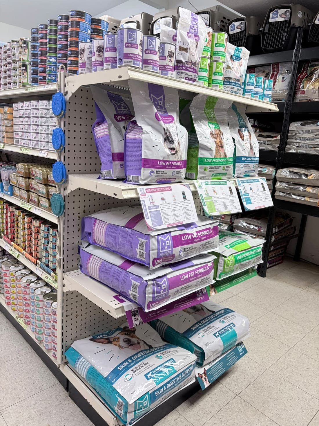Shelves of cat food bags and cans at the Revelstoke store
